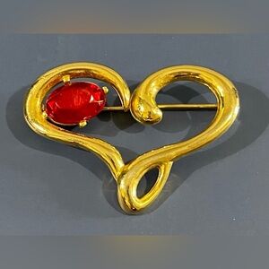 Elegant Gold Heart Brooch with Red Gemstone